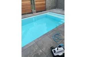 Gabione mit norwegischem Granit – Aufbauteam