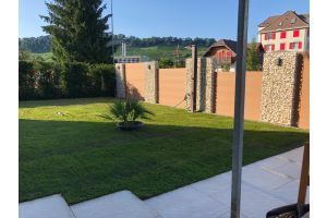 Aufbauteam Komposit – WPC-zaun mit Gabionen. Aufbauteam Komposit